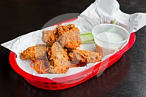 Fried chicken wings with ranch dressing