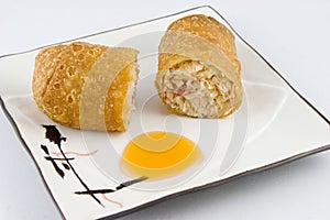 Fried chinese egg roll and sauce