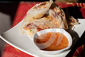 Fried chinese spring rolls with sweet chili sauce