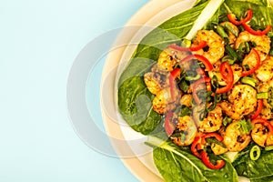 Fried Chinese Style Chilli Prawns On A Bed Of Steamed Pak Choi G