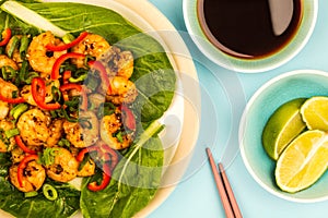 Fried Chinese Style Chilli Prawns On A Bed Of Steamed Pak Choi G