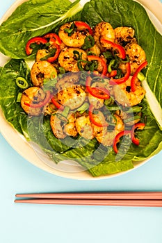 Fried Chinese Style Chilli Prawns On A Bed Of Steamed Pak Choi G