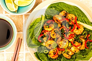 Fried Chinese Style Chilli Prawns On A Bed Of Steamed Pak Choi G