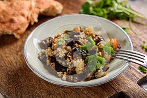 Fried chopped eggplant with garlic and bread crumbs