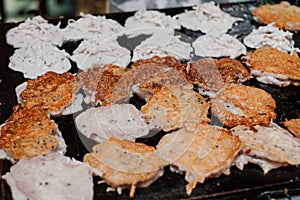 Fried coconut pancake or Baa Bin on hot stove at thailand.