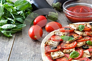 Fried cod fillet and salad in plate isolated