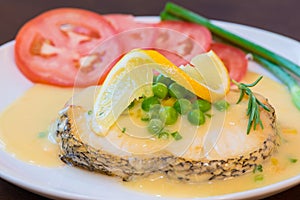 Fried cod fillets and vegetables