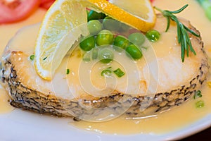 Fried cod fillets and vegetables