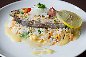 Fried cod fillets and vegetables