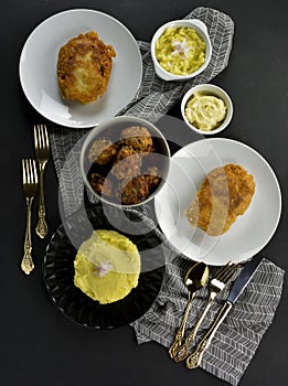 Fried cod fish fillets ,croquettes of cod fish , mayonnaise and garlic dip