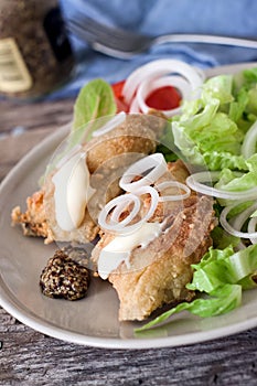 Fried cod and salad