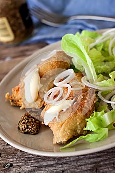 Fried cod and salad