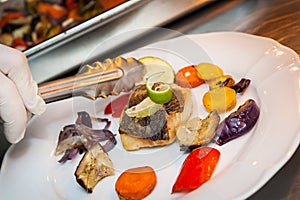 Fried cod with vegetables