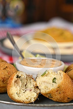 Fried codfish fritter typical Portuguese and Brazilian cuisine fish with herbs