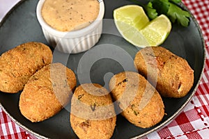 Fried codfish fritter typical Portuguese and Brazilian cuisine fish with herbs
