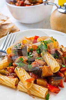 Fried Creole Aubergines Served with Penne Pasta and Parsley