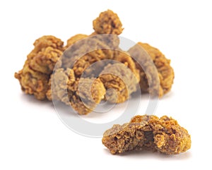 Fried and Crispy Chicken Gizzards on a White Background