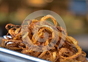 Fried crispy onion strings