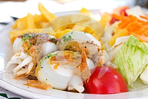 Fried cuttle fish with salad