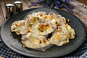 Fried dumplings (pierogi) with spinach