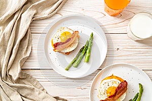 fried egg with bacon and cheese on pancake