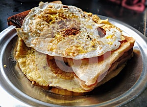 Fried egg with bread for Breakfast