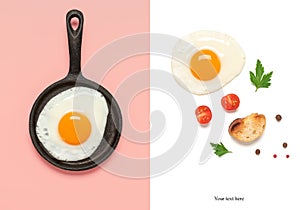 Fried egg. Creative layout. Breakfast concept. Double white-pink background. Top view, flat lay