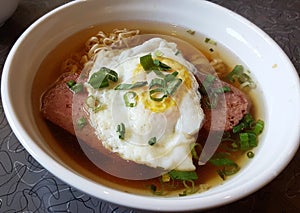 Fried Egg and Ham in Noodle Soup