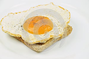 Fried Egg with Salt and Pepper on Toast