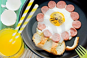 Fried egg with sausage and toast shaped cute lion