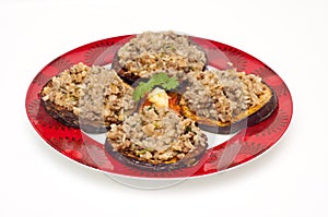 Fried eggplant topped with a mix of mince and rice