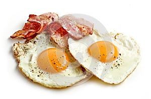 Fried eggs and bacon photo