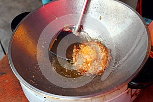 Fried eggs that are fried in an electric frying pan until crispy 2