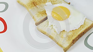 Fried eggs and toasts