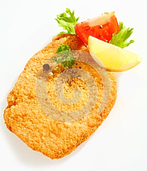 Fried escalope of veal with lemon photo