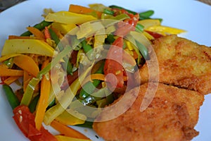Fried fish with blanched vegetables