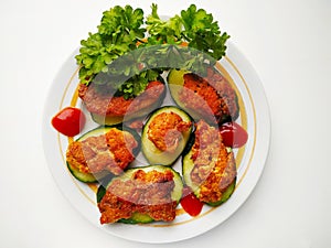 Fried fish roe on a cucumber slice decorated with dill photo