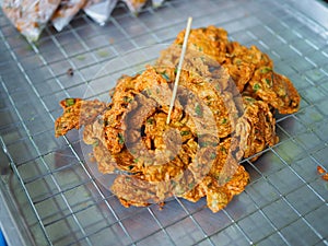 Fried fish chili paste mix `Thord Mun`, Thai local traditional food