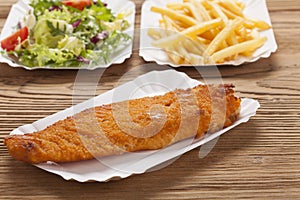 Fried fish and chips on a paper tray
