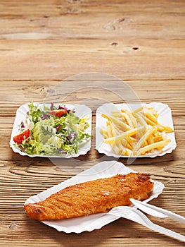 Fried fish and chips on a paper tray