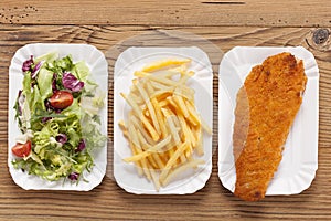 Fried fish and chips on a paper tray