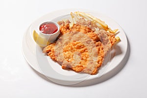 Fried fish and chips on the white plate