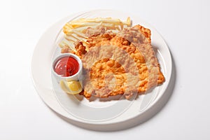 Fried fish and chips on the white plate