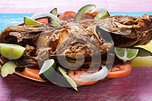 Fried fish on colorful background