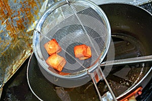 Fried fish cube preparing for Thai cuisine