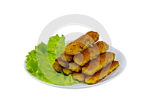 Fried fish fingers on plate with lettuce isolated on white background