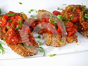 Fried fish herring with tomato sauce