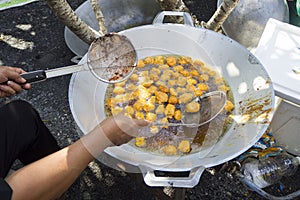 Fried fish-paste balls in pan