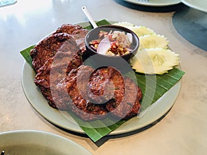 Fried fish-paste balls in Thailand.