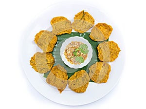 Fried fish patty on white background